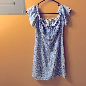 Short blue dress with yellow flowers,brand is shein and is a size 6
